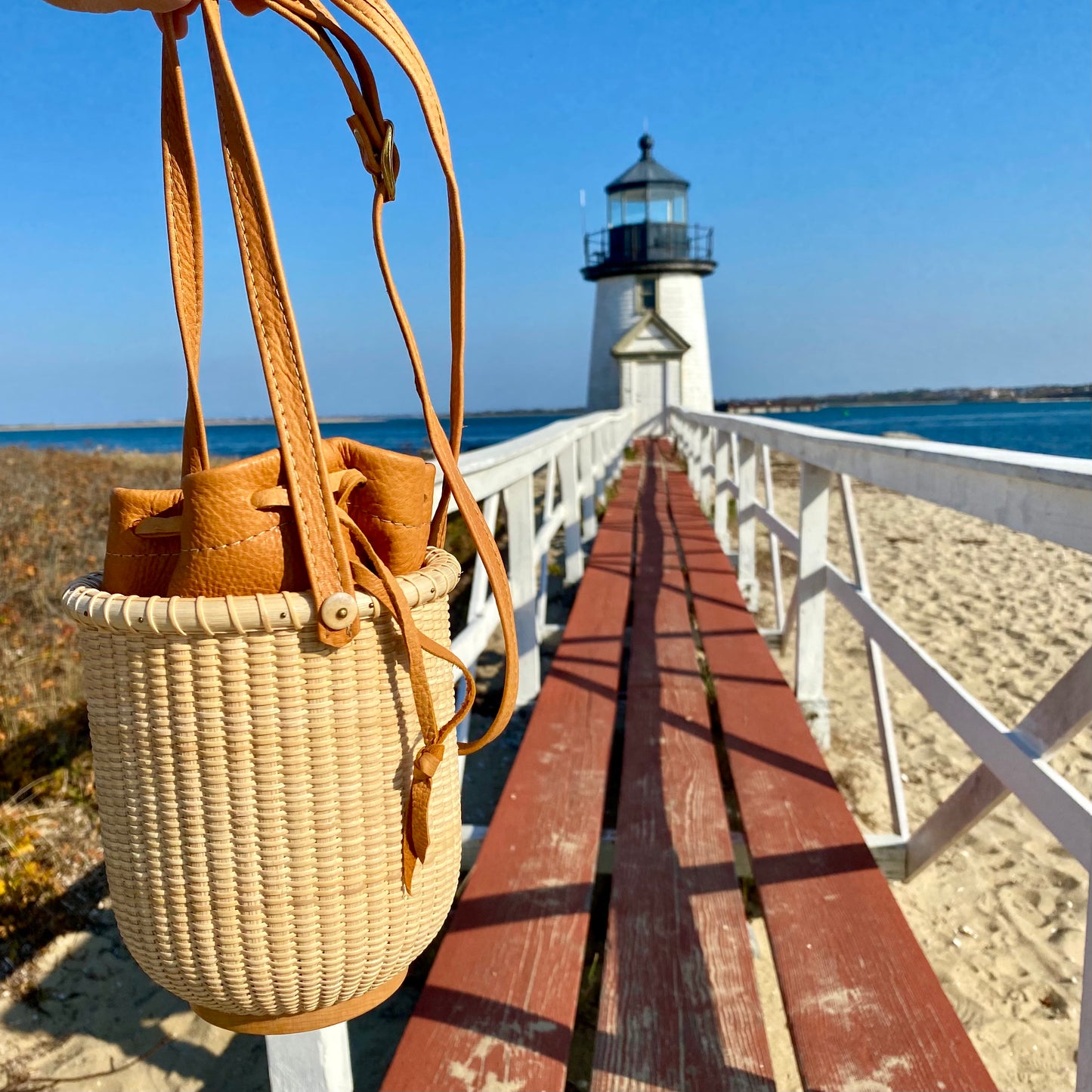 5" Round Handwoven Tote with Tan Leather drawstring bag