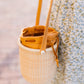 5" Round Handwoven Tote with Tan Leather drawstring bag