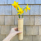 Handwoven Bud Basket 1.75" x 8" holding yellow daffodils